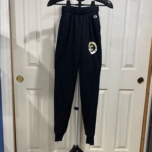 Champion Black Joggers with Gold Emblem